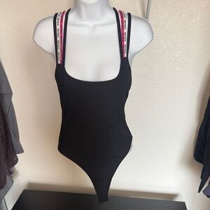 Black Ribbed Women's Bodysuit with Pink-Accent Straps